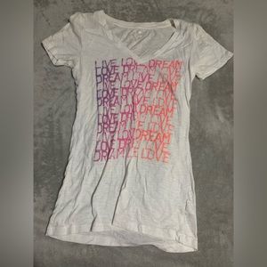 Multiple t shirts and tank tops